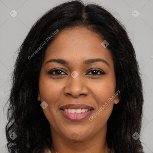 Joyful black young-adult female with long  brown hair and brown eyes