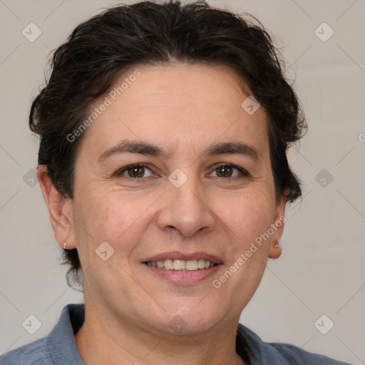 Joyful white adult female with short  brown hair and brown eyes