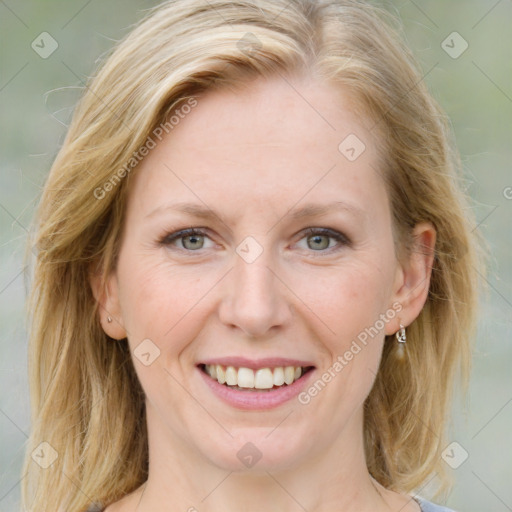 Joyful white young-adult female with medium  brown hair and blue eyes