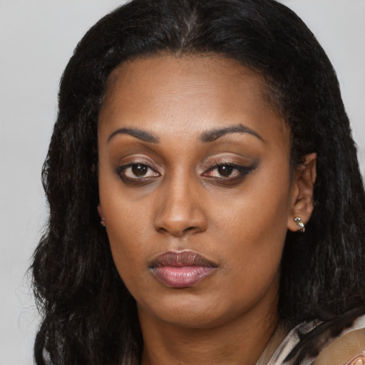 Neutral latino young-adult female with long  black hair and brown eyes