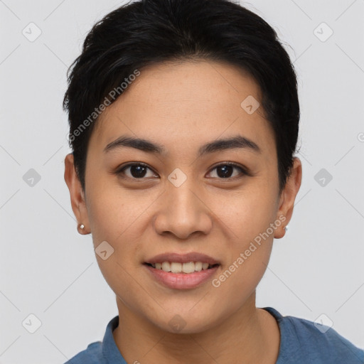 Joyful asian young-adult female with short  brown hair and brown eyes