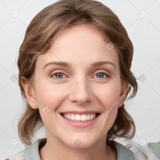 Joyful white young-adult female with medium  brown hair and blue eyes