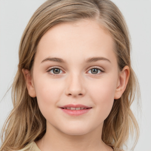 Joyful white child female with medium  brown hair and brown eyes