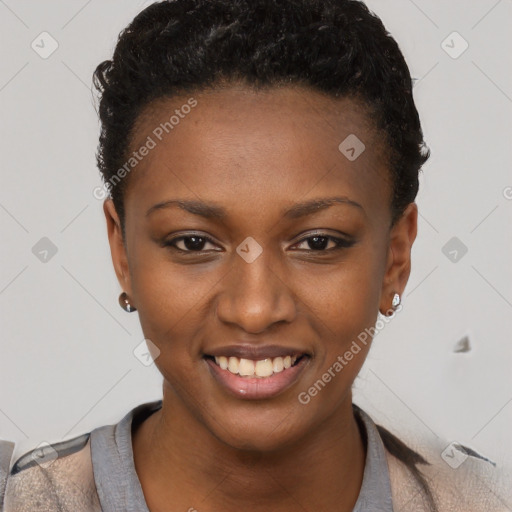 Joyful black young-adult female with short  black hair and brown eyes