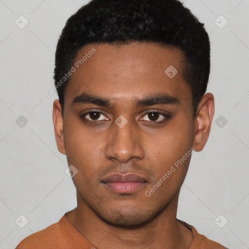 Neutral latino young-adult male with short  black hair and brown eyes