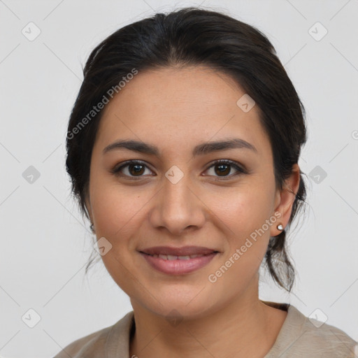 Joyful latino young-adult female with medium  brown hair and brown eyes