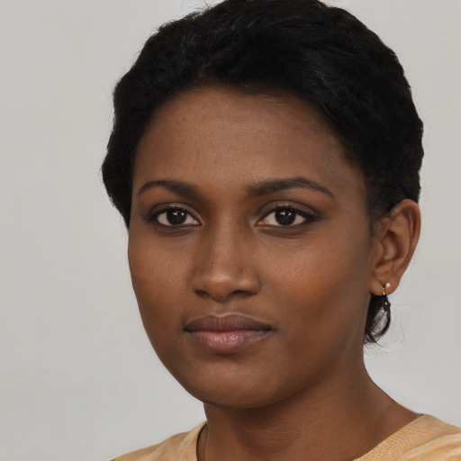 Neutral black young-adult female with short  black hair and brown eyes