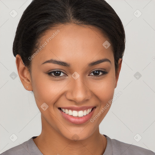 Joyful latino young-adult female with short  brown hair and brown eyes