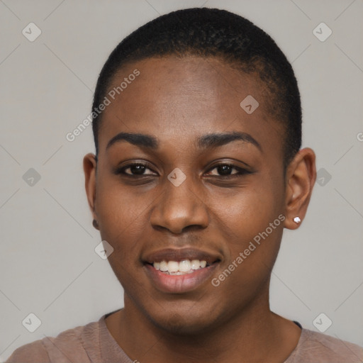 Joyful black young-adult female with short  black hair and brown eyes