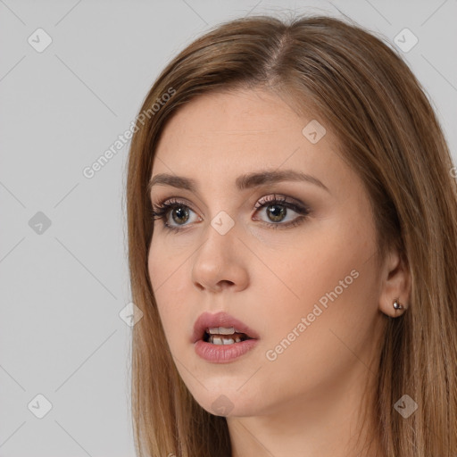 Neutral white young-adult female with long  brown hair and brown eyes