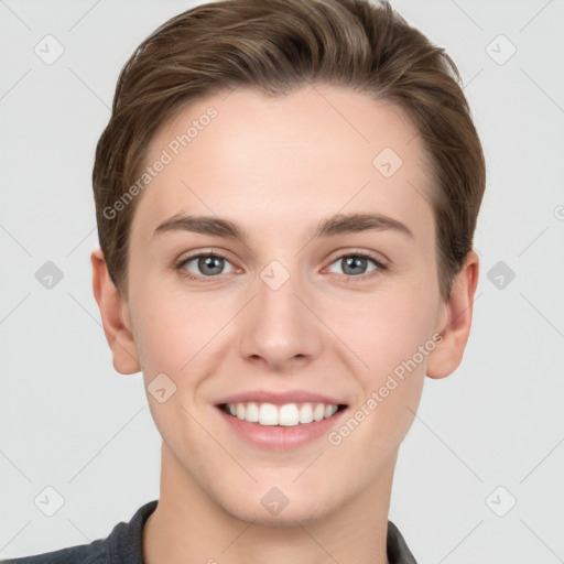 Joyful white young-adult female with short  brown hair and grey eyes