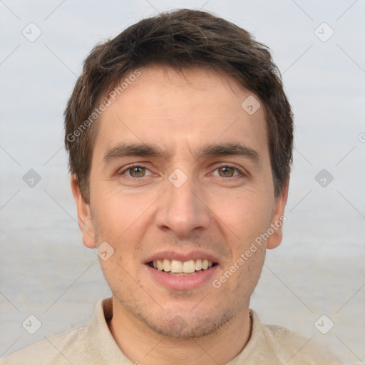 Joyful white adult male with short  brown hair and brown eyes