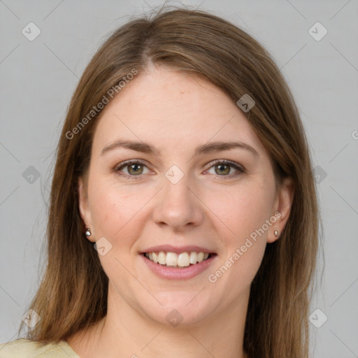 Joyful white young-adult female with medium  brown hair and green eyes