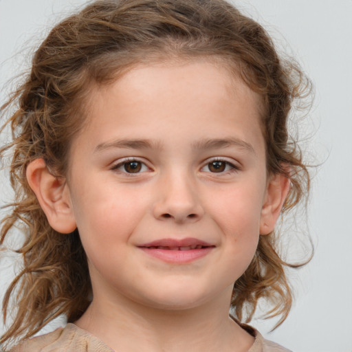 Joyful white child female with medium  brown hair and brown eyes