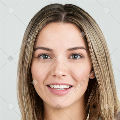 Joyful white young-adult female with long  brown hair and green eyes