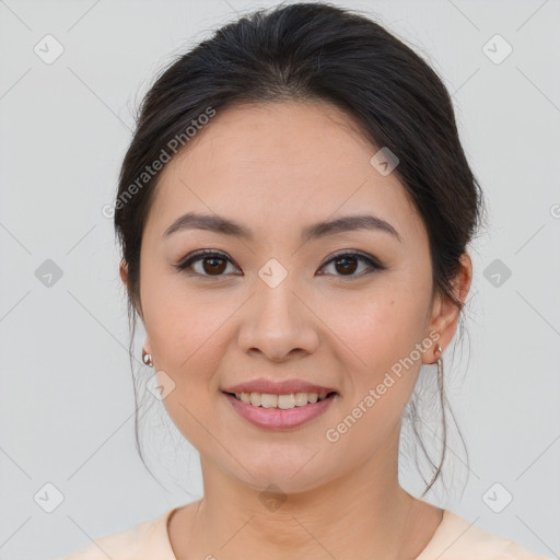 Joyful asian young-adult female with medium  brown hair and brown eyes