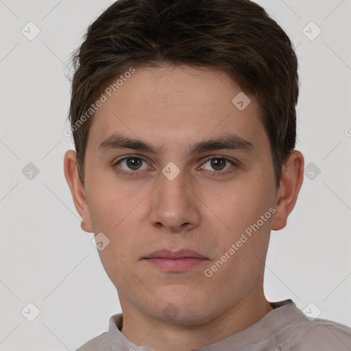 Neutral white young-adult male with short  brown hair and brown eyes