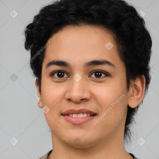 Joyful latino young-adult female with short  brown hair and brown eyes