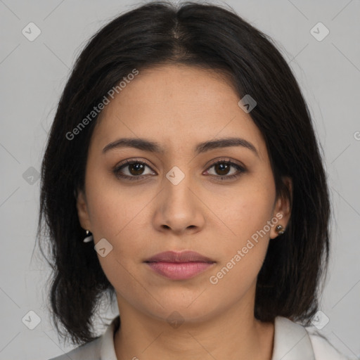 Joyful latino young-adult female with medium  brown hair and brown eyes