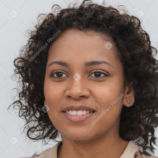 Joyful black young-adult female with medium  brown hair and brown eyes