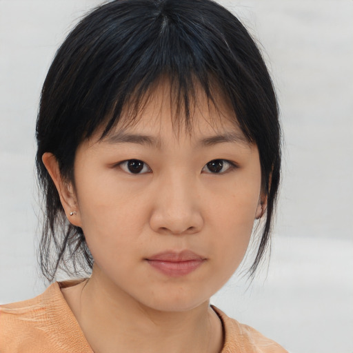 Neutral asian young-adult female with medium  brown hair and brown eyes