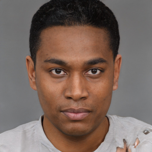 Neutral black young-adult male with short  black hair and brown eyes