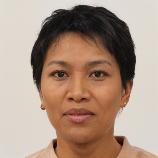 Neutral asian adult female with short  brown hair and brown eyes