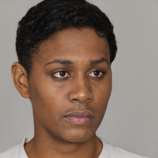Neutral black young-adult female with short  brown hair and brown eyes
