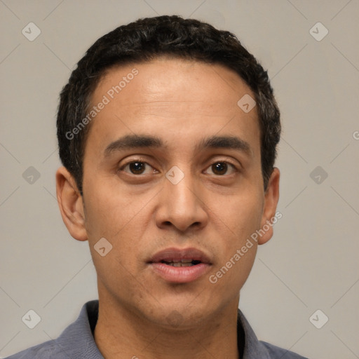 Neutral white young-adult male with short  black hair and brown eyes