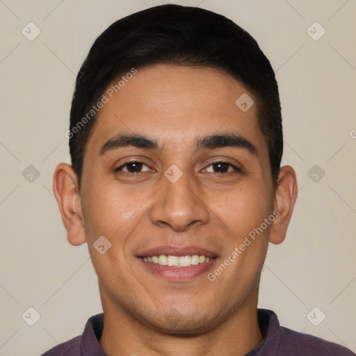 Joyful white young-adult male with short  black hair and brown eyes