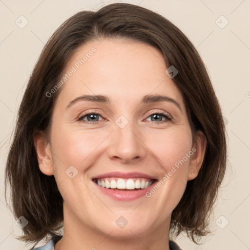 Joyful white young-adult female with medium  brown hair and green eyes