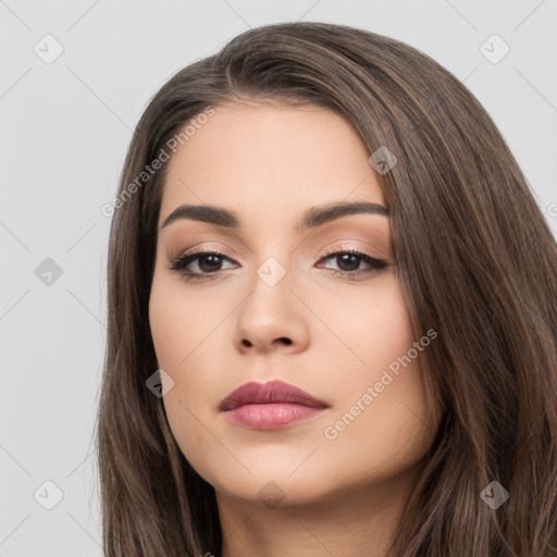 Neutral white young-adult female with long  brown hair and brown eyes