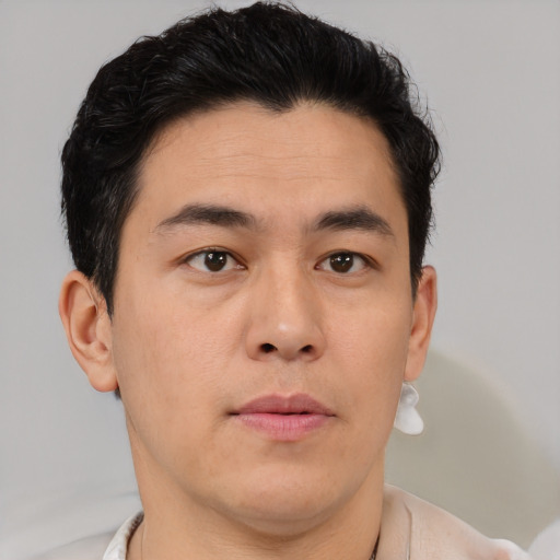 Neutral asian young-adult male with short  brown hair and brown eyes