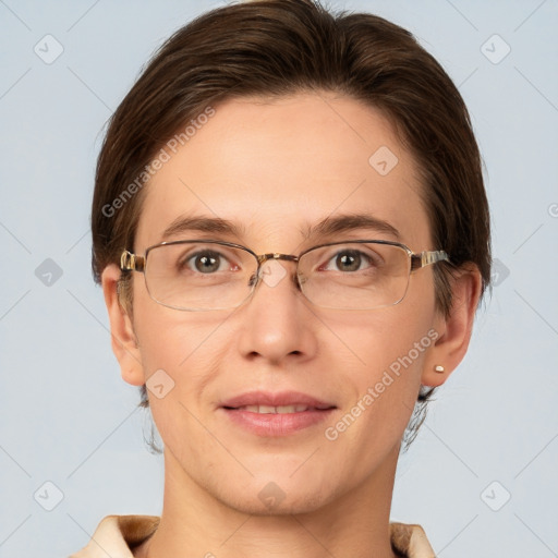 Joyful white adult female with short  brown hair and grey eyes