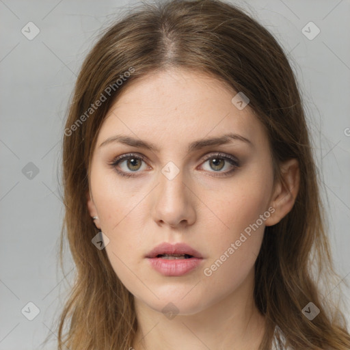 Neutral white young-adult female with long  brown hair and brown eyes