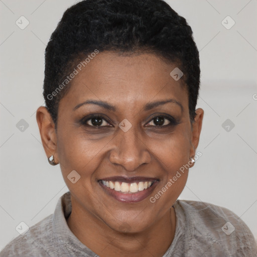 Joyful black adult female with short  brown hair and brown eyes