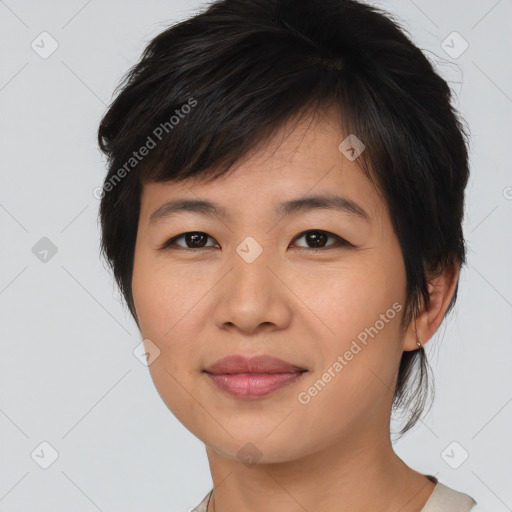 Joyful asian young-adult female with medium  brown hair and brown eyes