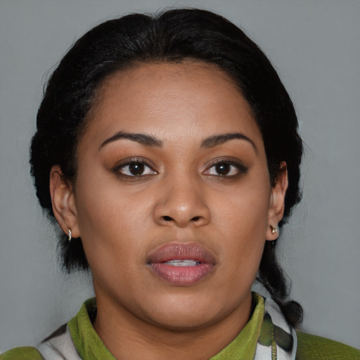Joyful asian young-adult female with medium  black hair and brown eyes