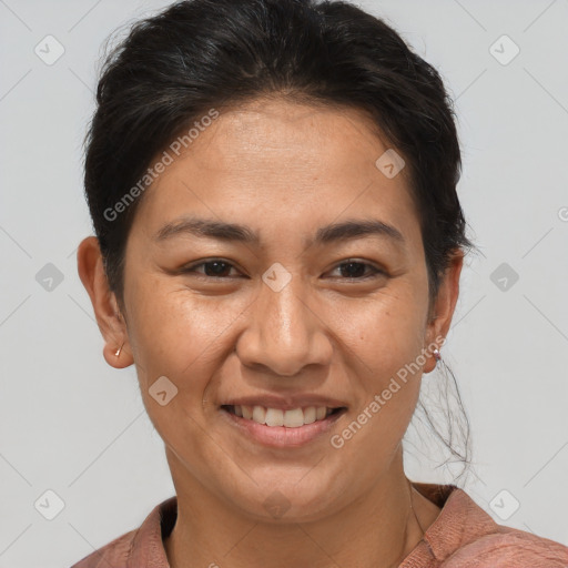 Joyful white adult female with short  brown hair and brown eyes