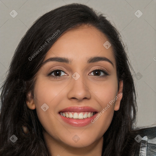 Joyful latino young-adult female with long  black hair and brown eyes