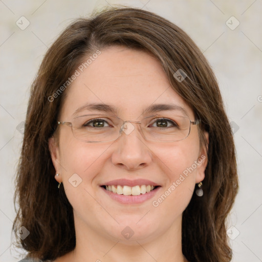 Joyful white adult female with medium  brown hair and green eyes