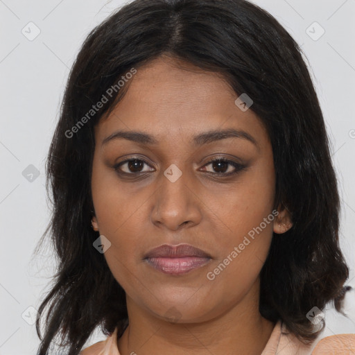Joyful asian young-adult female with long  brown hair and brown eyes