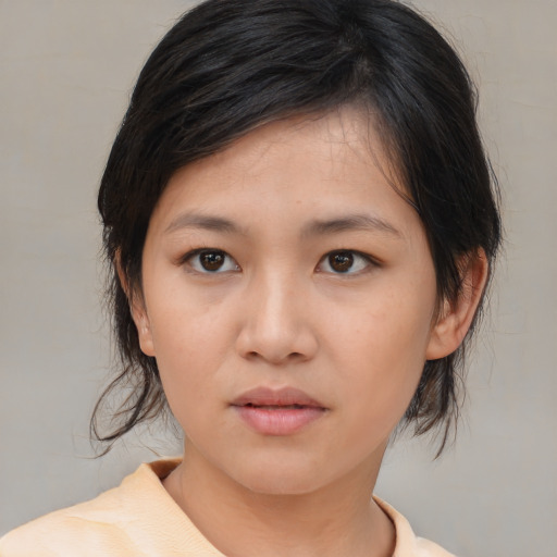 Neutral white young-adult female with medium  brown hair and brown eyes