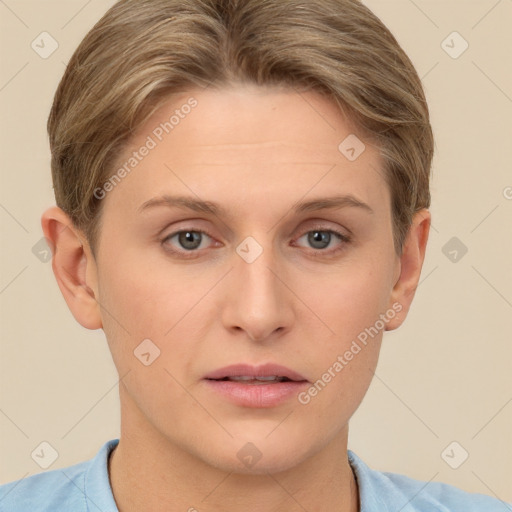 Joyful white young-adult female with short  brown hair and grey eyes