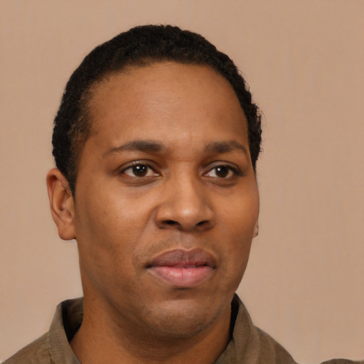 Neutral latino young-adult male with short  brown hair and brown eyes