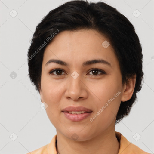 Joyful latino young-adult female with medium  brown hair and brown eyes