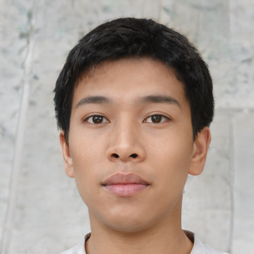 Neutral asian young-adult male with short  black hair and brown eyes