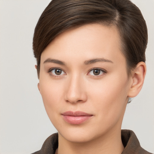 Neutral white young-adult female with short  brown hair and brown eyes