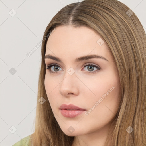 Neutral white young-adult female with long  brown hair and brown eyes