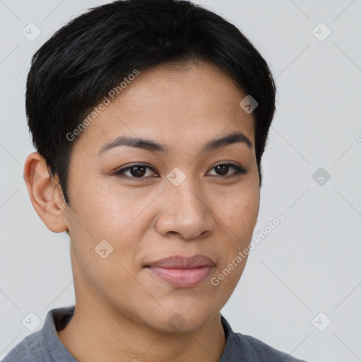 Joyful asian young-adult female with short  brown hair and brown eyes